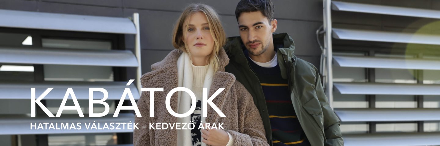 Egy férfi és egy nő télikabátban állnak egymás mellett egy modern épület előtt; a szöveg: "Kabátok - Hatalmas választék, kedvező árak."